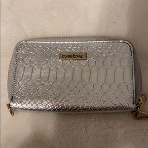 Unused Bebe silver wristlet